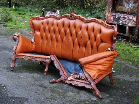 Waste collection vehicle parked in Alperton with staff preparing bins