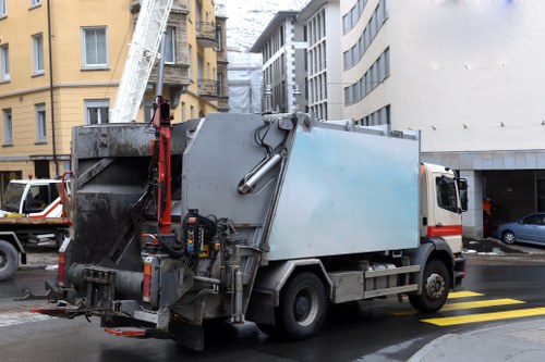 Workers following safety procedures during a site pickup